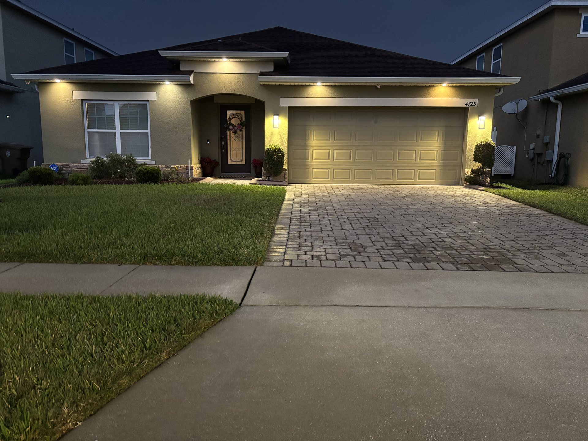 Exterior lighting scene recalled from the whole-home smart control system