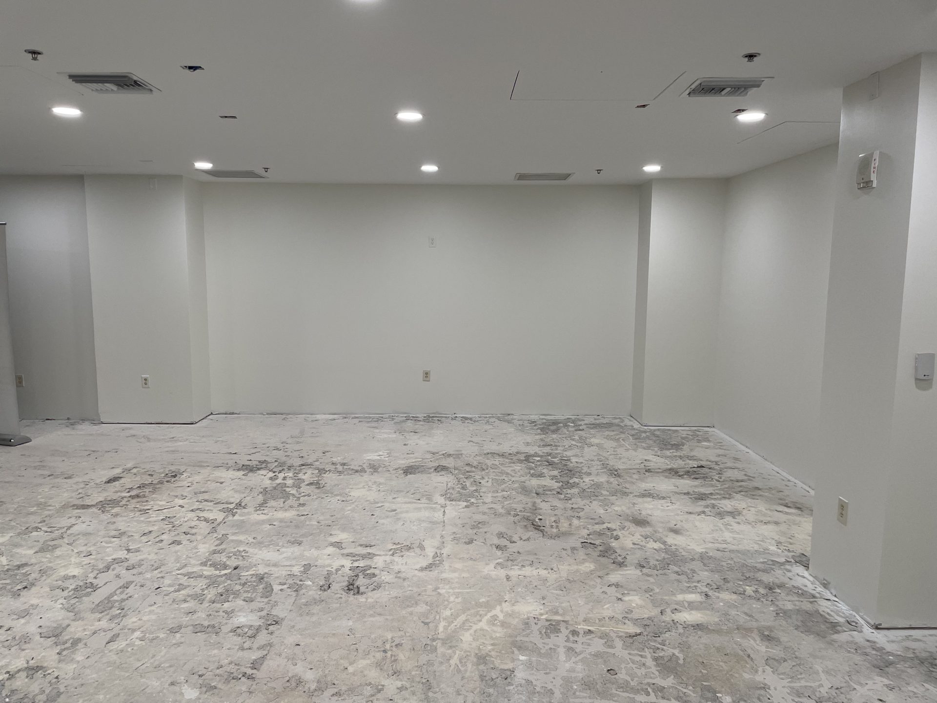 Lobby wall prepared for the large-format display with in-wall AV and power rough-in before finishes
