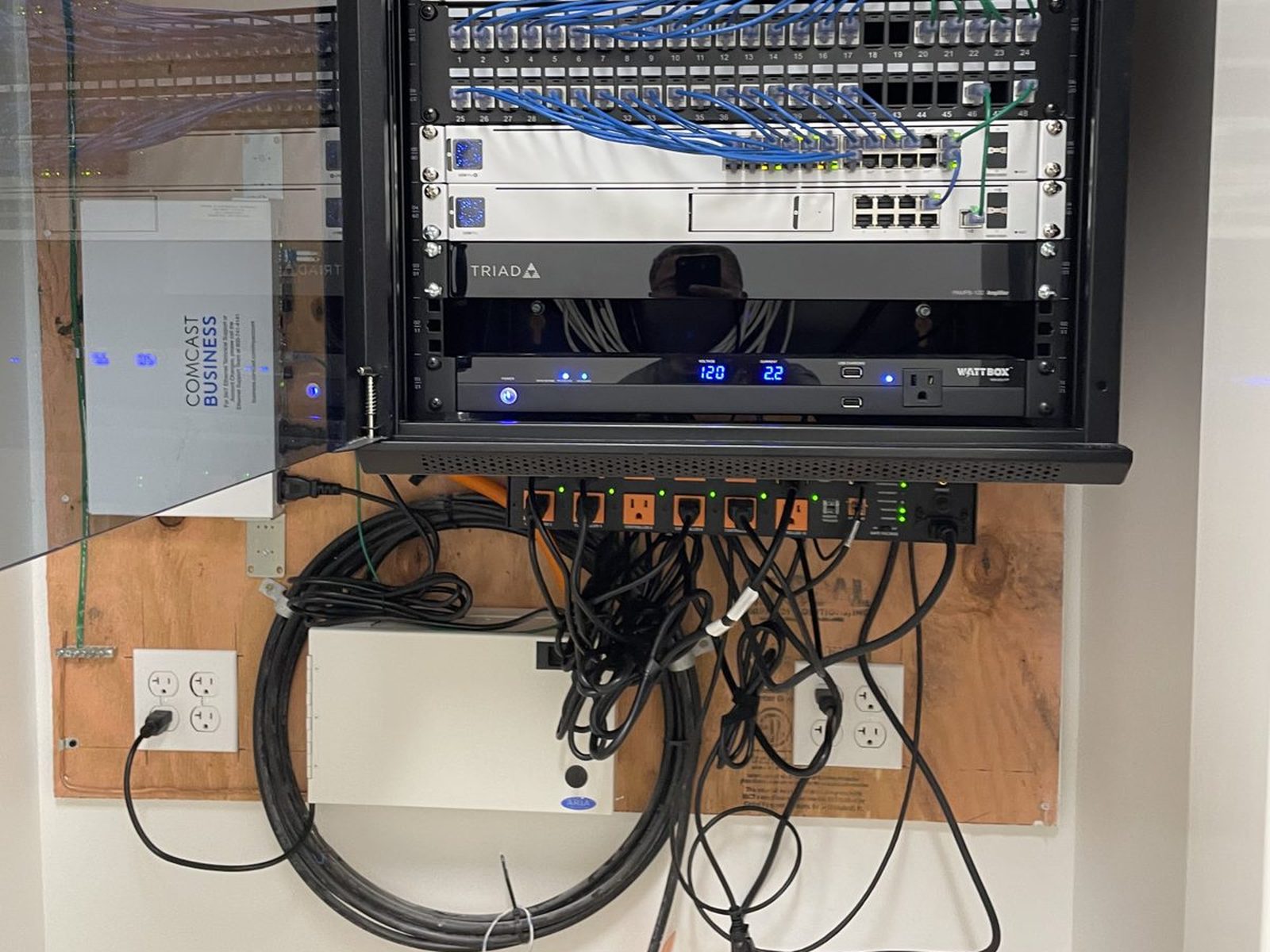 Finished commercial network rack with patch panels, switches and labeled terminations